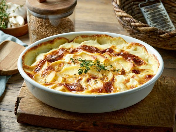 Quels conseils pour un parfait gratin de pommes de terre au fromage râpé?